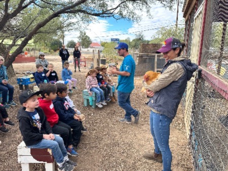 Kids in chicken lesson